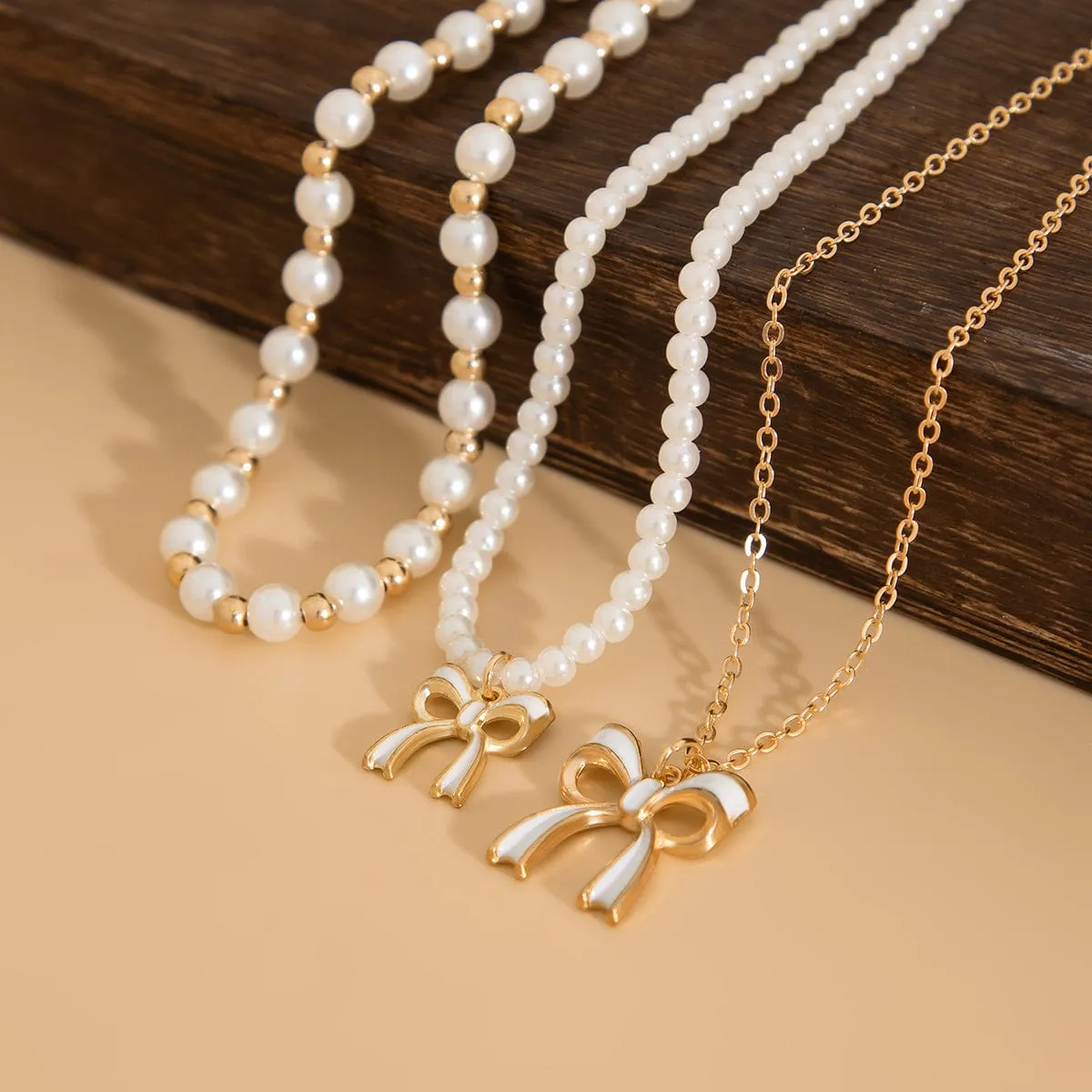 Elegant Layered Enamel Bowknot Pendant Pearl Chain Necklace Set